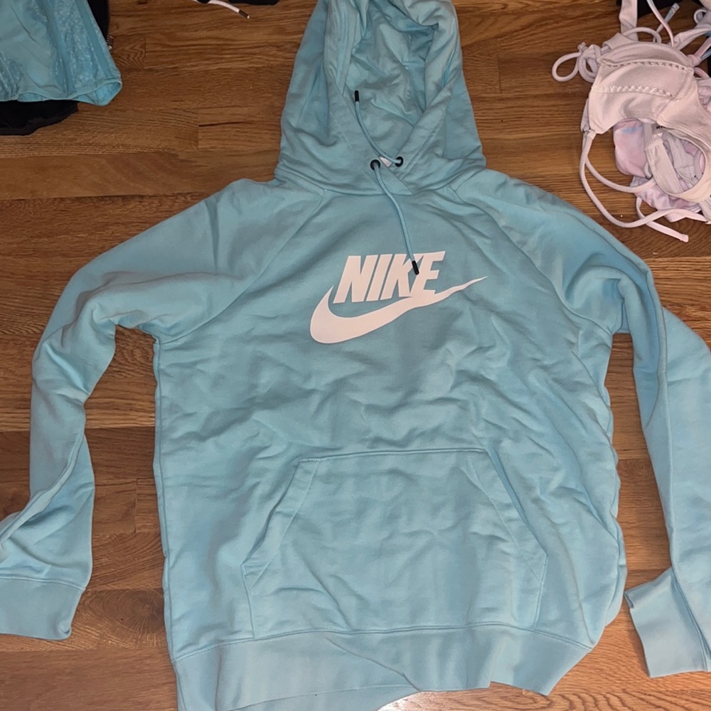 Never worn Nike light blue hoodie size medium!